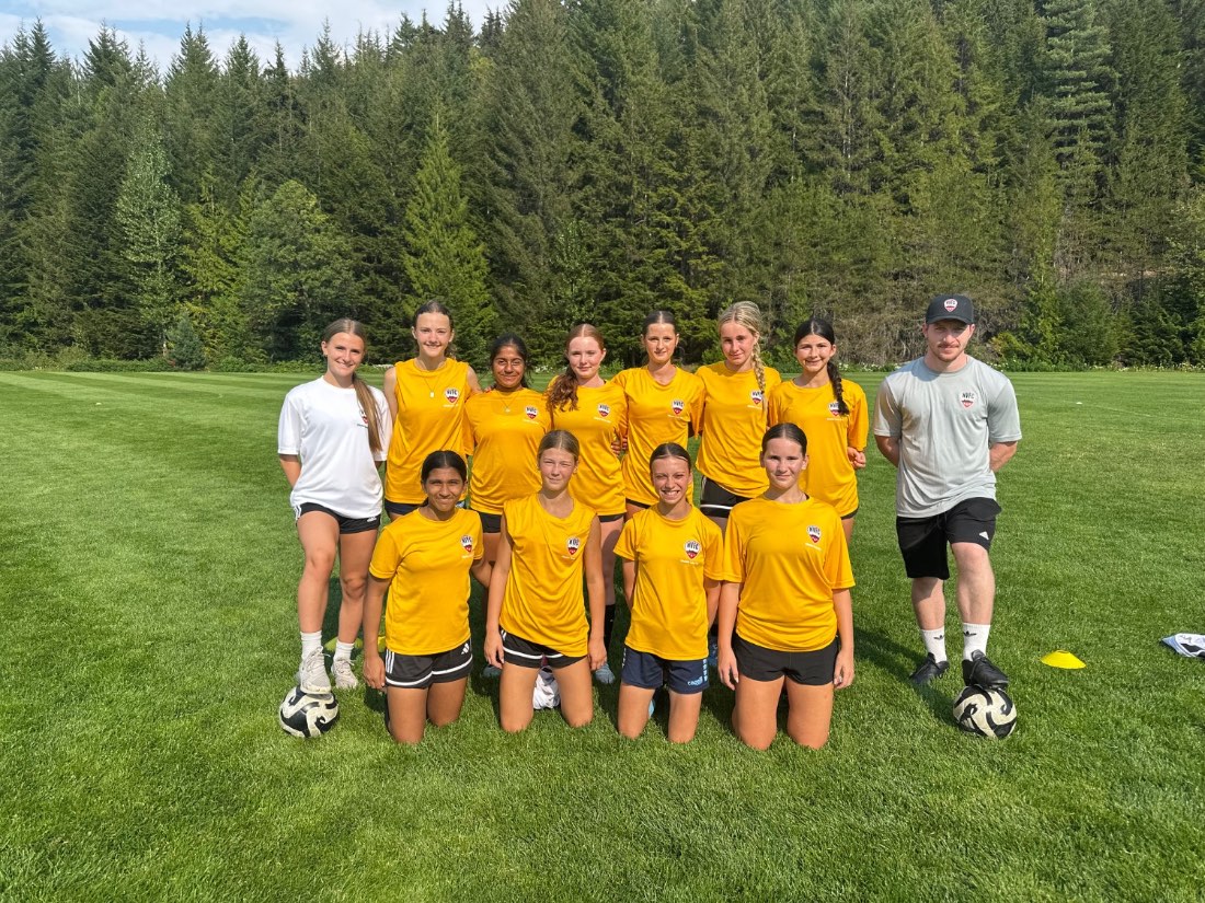A camp group on the grass field